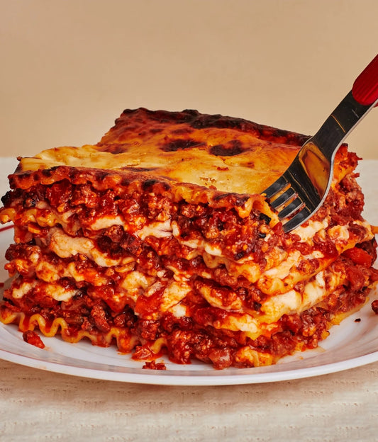 Lasagna - Beef, Chicken or Pork -  baked to perfection for a comforting culinary experience!